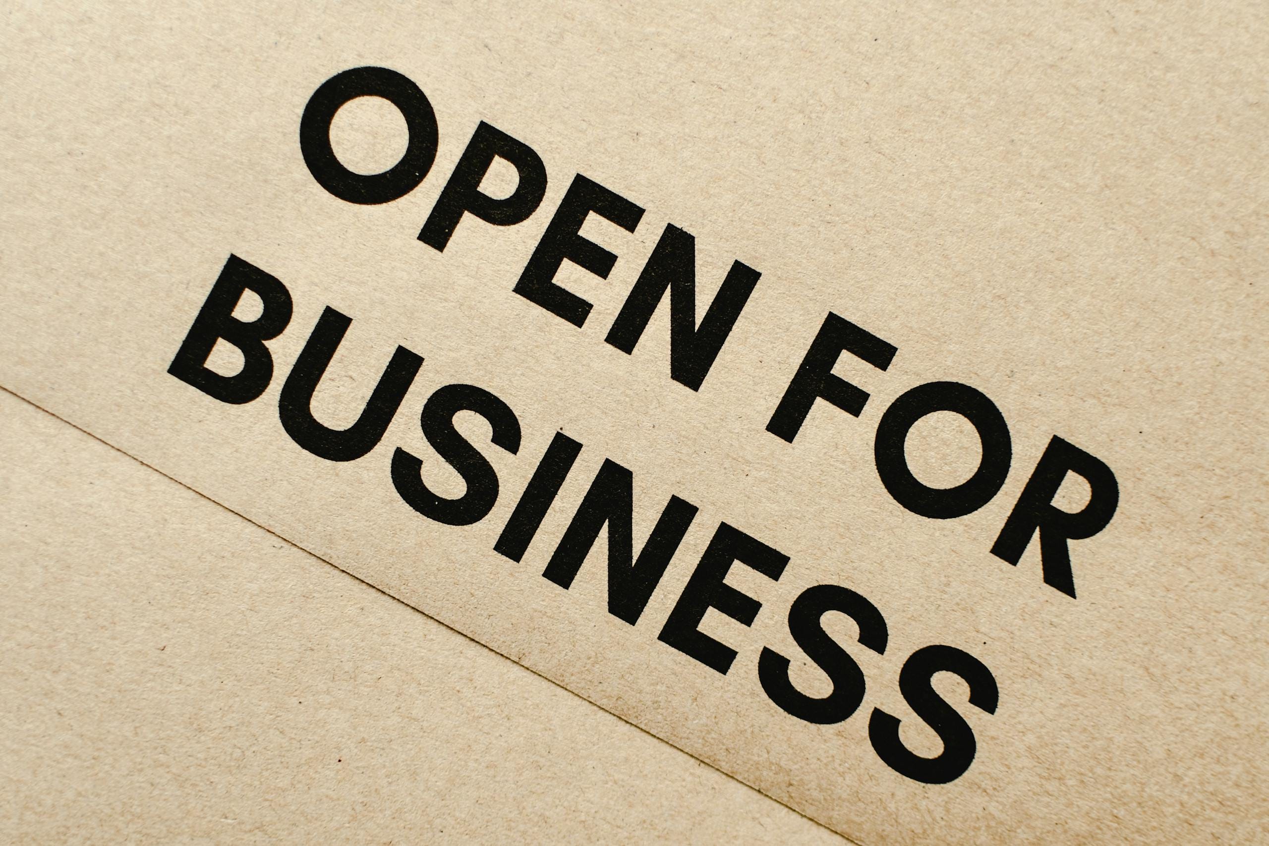 Close-up of an Open for Business sign