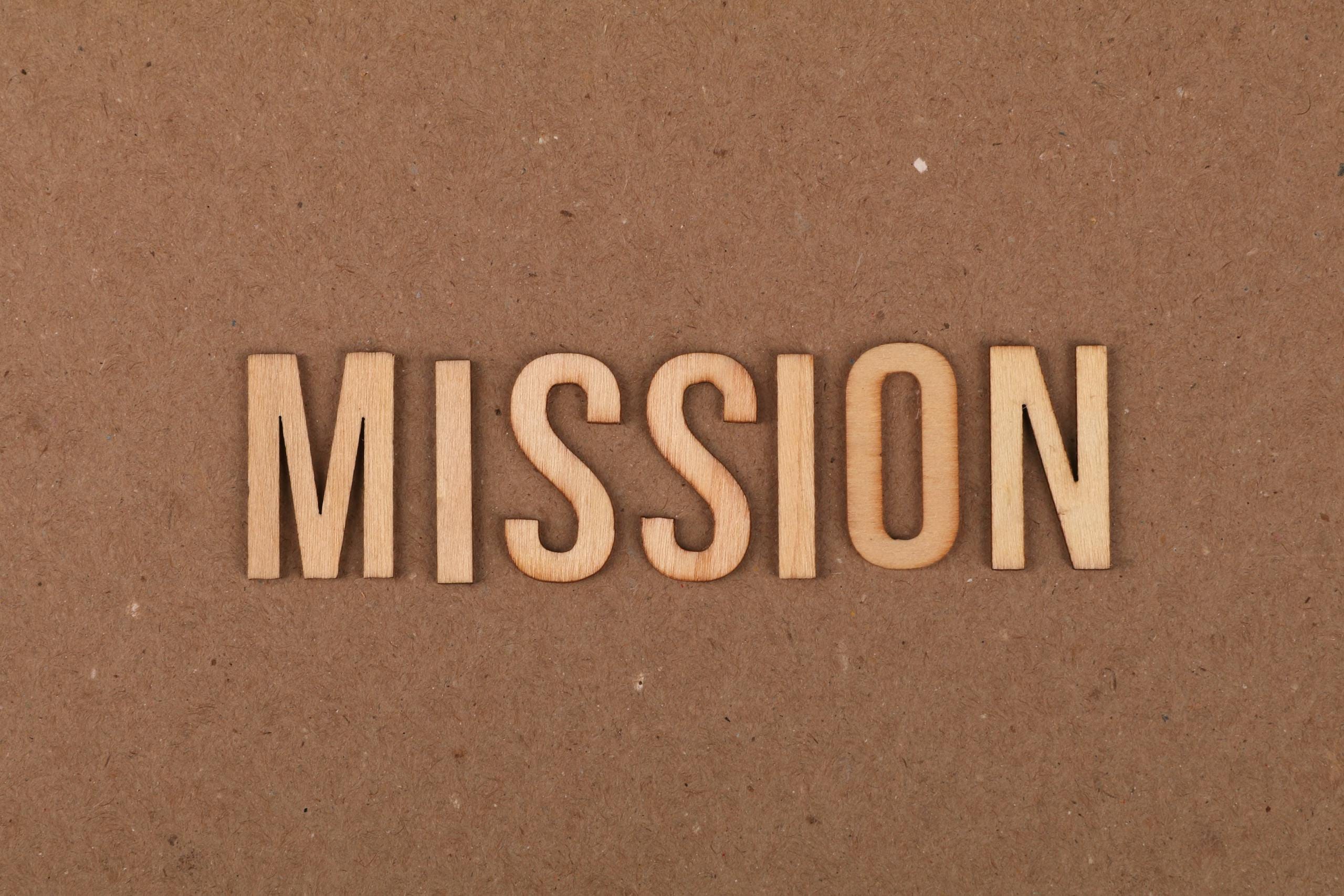 Wood letters spell the word Mission